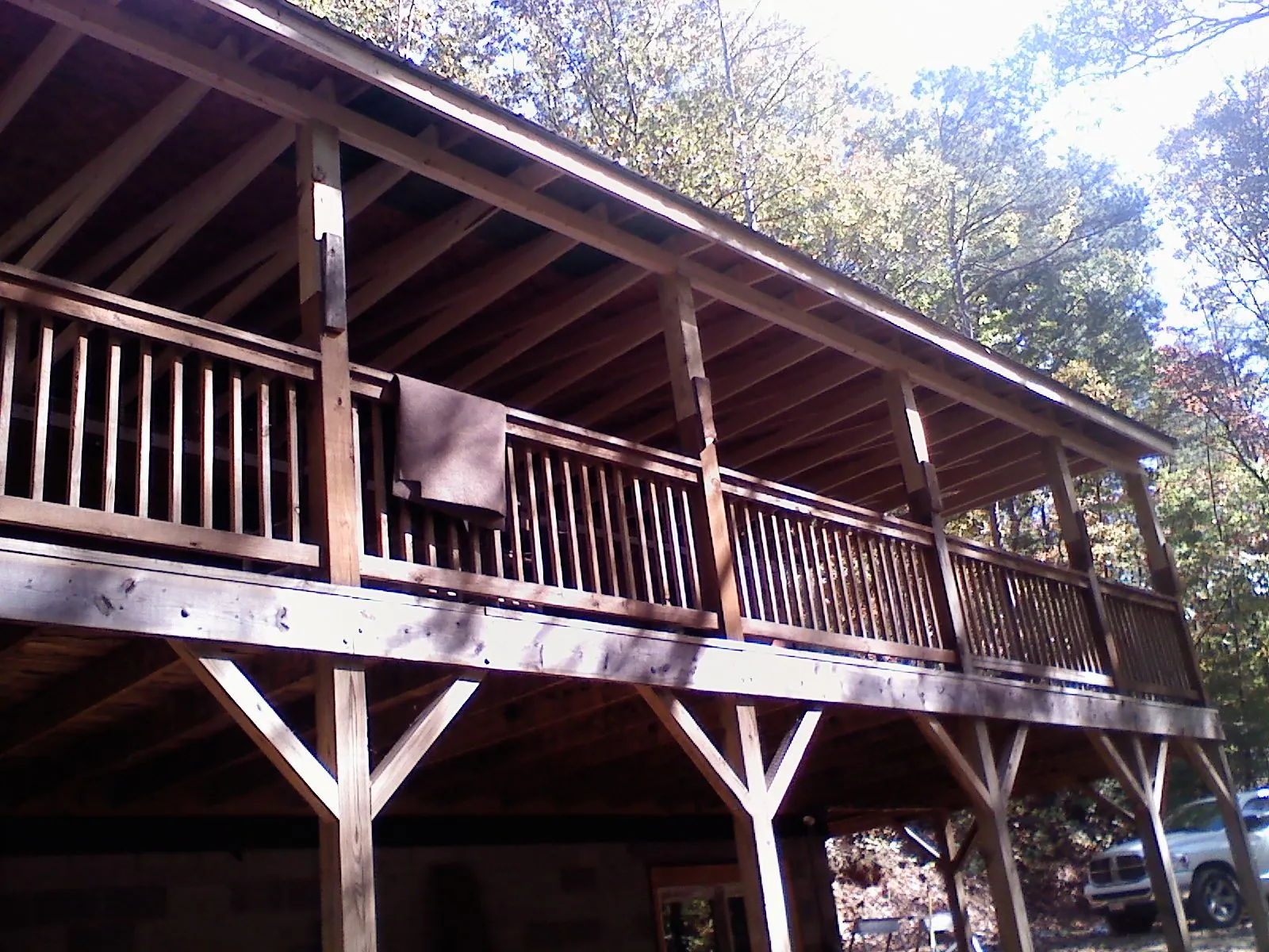 Timber framing under a new elevated porch and deck — Roof Leak Repair in South Houston by Roofing Brothers
